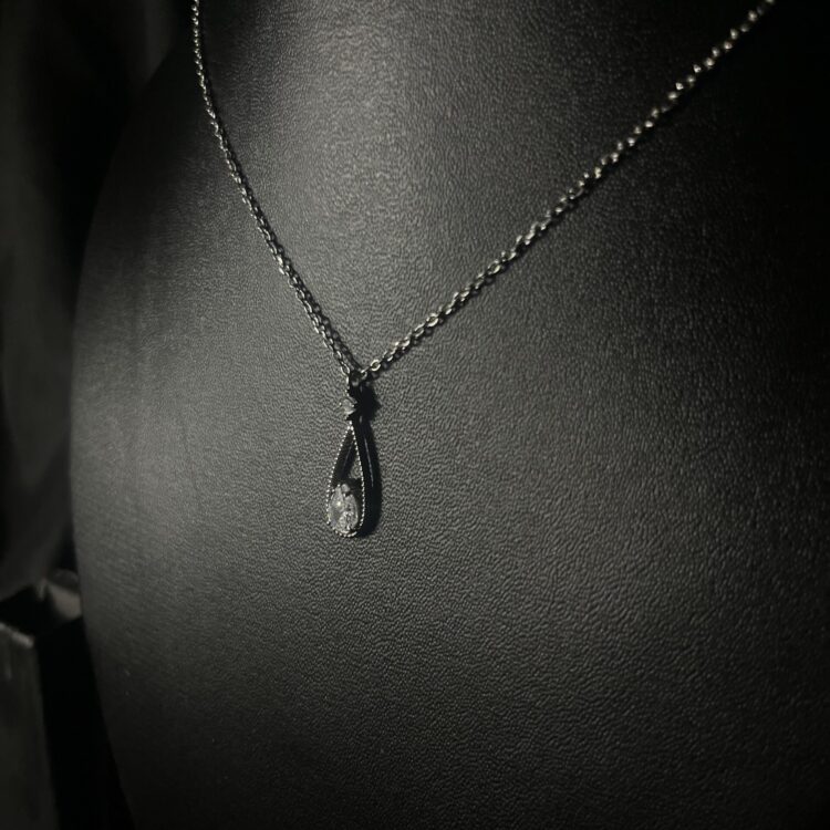Elegant Silver Open-Frame Pear Drop Necklace
